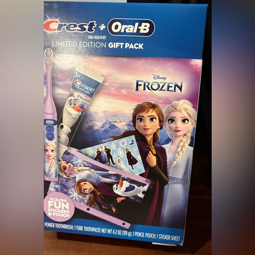NIB Disney Frozen crest and oral B electric toothbrush and toothpaste set